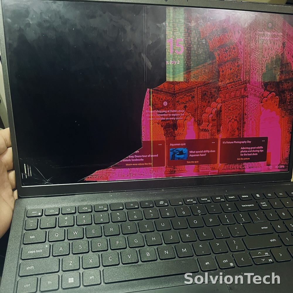 Cracked Dell Inspiron 15 laptop screen before repair